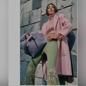 The coat is handmade. Custom made by the designer.